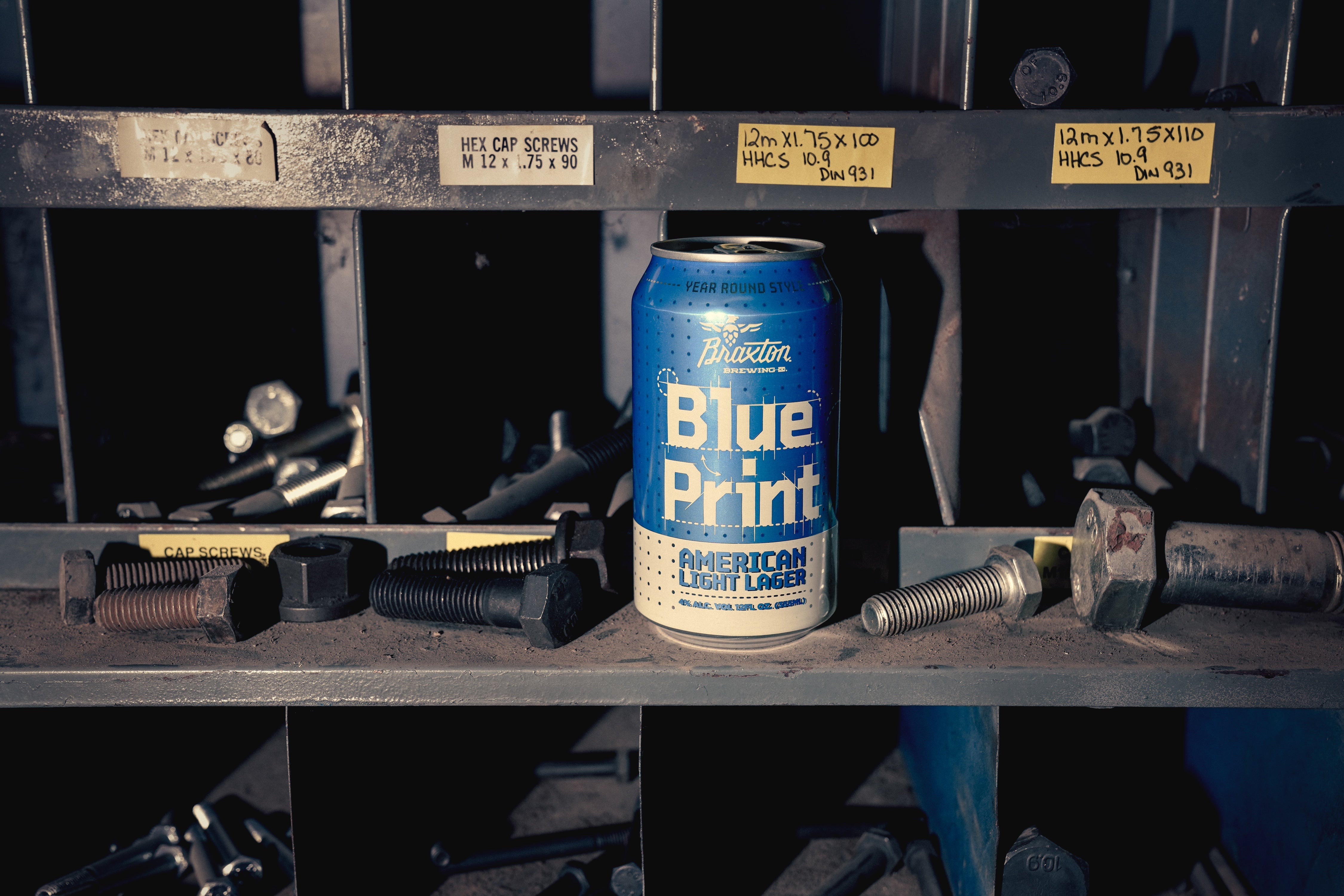 Blue Print can on a hardware shelf